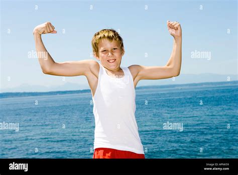 Kids Flexing Muscle Hi Res Stock Photography And Images Alamy