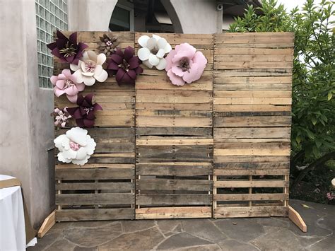 Pallet Wall With Paper Flowers Perfect For Bridal Shower