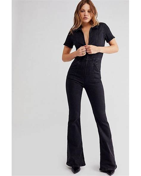 Free People Jayde Flare Jumpsuit At Free People In Black Mamba Size