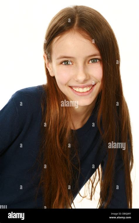 Portrait Of Smiling Preteen Girl Isolated On White Photo Stock Alamy