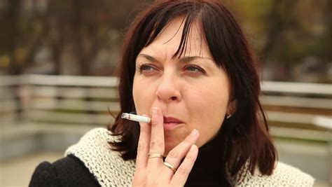 Beautiful Woman Smoking A Cigarette Stock Footage Video 4547933