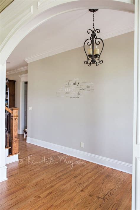 These are my favorite benjamin moore gray paint colors. Foyer with Behr Sculptor Clay and Silky White Trim -A BM Revere Pewter Alternative - Behr ...