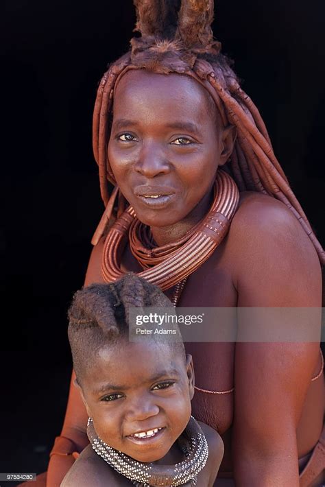 A Himba Woman And Her Daughter Namibia High Res Stock Photo Getty Images