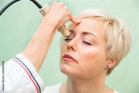Ultrasound Examination Of The Eyes An Ultrasound Scanner Examines The