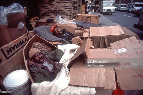 Homeless Men Sleep In Cardboard Boxes Near The Port Authority Bus