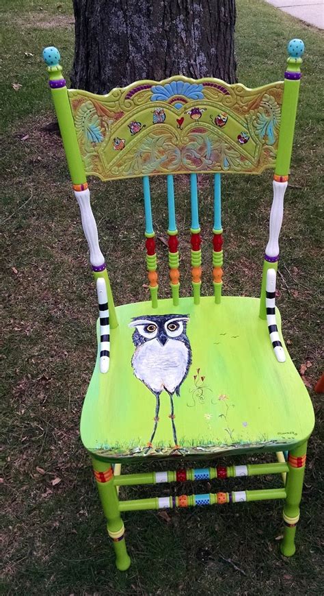 There is only one woman. How many of you like to paint chairs? I love to paint ...