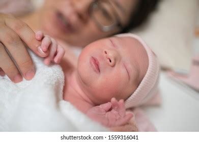 Unrecognizable Mother Bathing Her Son White Stock Photo