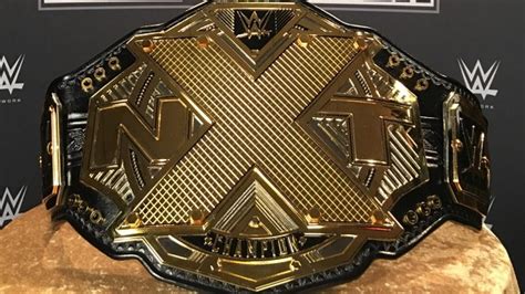 Videos Wwe Shows Off New Nxt Title Belts Triple H Comments On New