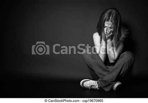 Sad Woman In Depression And Despair Crying On Black Dark Background