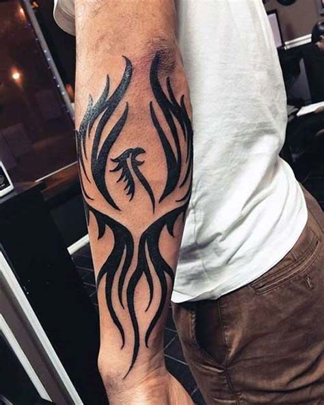 Forearm tattoos are loved and practiced by both men and women. forearm tribal phoenix tattoo tribal arm phoenix tattoo ...