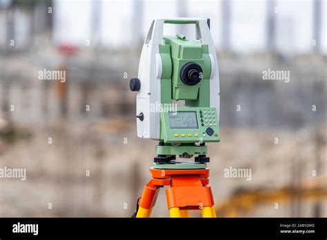 Survey Equipment Theodolite And Total Station At Construction Site