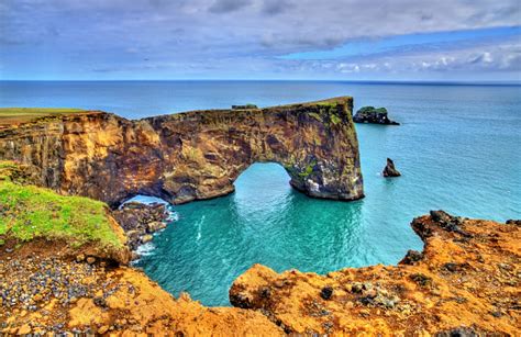 Natural Arch Of Dyrholaey Peninsula Iceland Stock Photo Download