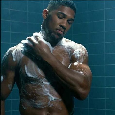 Photos of British-Nigerian Boxer, Anthony Joshua Taking His Bath Surface