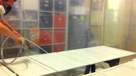For example, any holes or scratches can be filled with spackling compound. Spraying kitchen cabinets white with airless sprayer in ...
