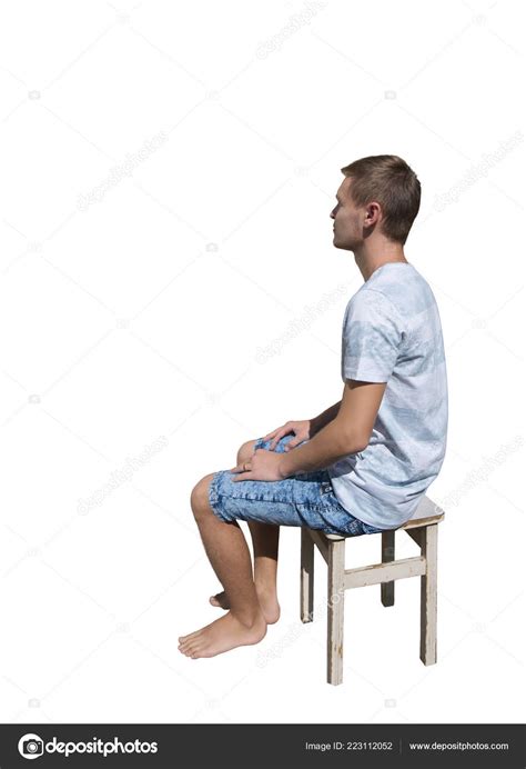Side View Full Length Portrait Pensive Young Man Sitting Chair Stock
