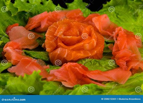 Sashimi Syake With Salmon Slices Arranged In Form Of Rose Lemon Slices