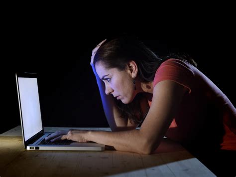 Depressed Worker Or Student Woman Working With Computer Alone Late