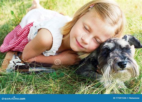 Cute Little Girl Hugging Her Little Dog Stock Photo Image Of Happy