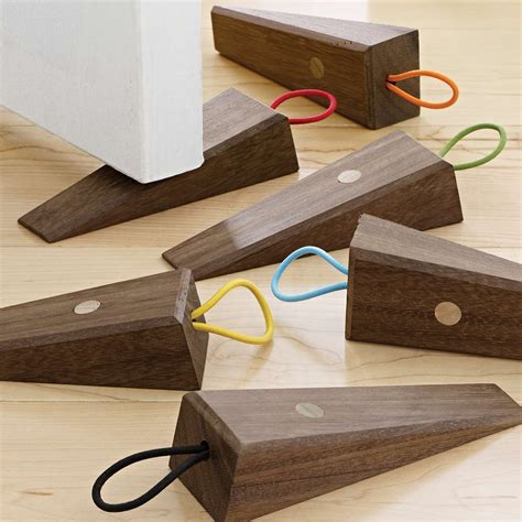 Bring the outdoors in with this colorful leaf doorstop! Doublestop Doorstop | Smart Furniture | Wooden door stops ...