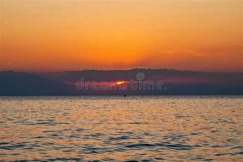 Dramatic Sunset Over Sea And Mountain Photographed In Pirgos Sani On