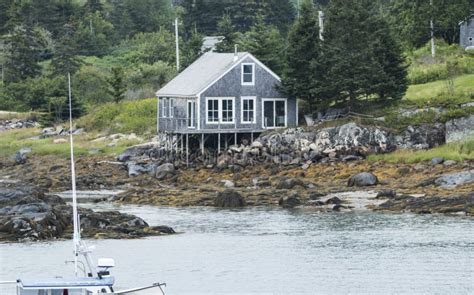 Waterfront House On Stilts In Maine Stock Photo Image Of Houses