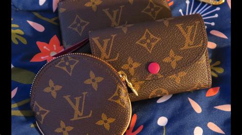 It is a bit thicker (circled lv) and bigger (louis vuitton paris) on the authentic pochette. LOUIS VUITTON ROUND COIN PURSE, ROSALIE COIN PURSE & KEY ...