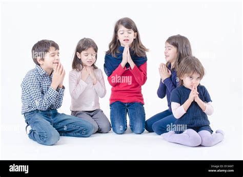 Kids Praying Hi Res Stock Photography And Images Alamy
