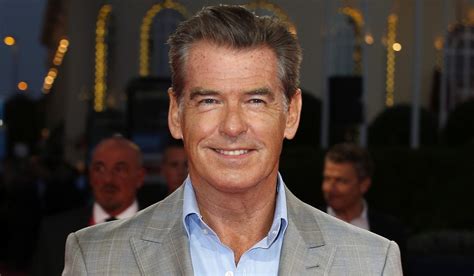 in costume pierce brosnan unrecognisable as he snaps photo with fan