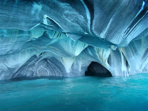 There's a place you can visit that you'll swear is ariel's grotto from the disney classic. Marble Caves, Patagonia, Chile | Beautiful Places to Visit