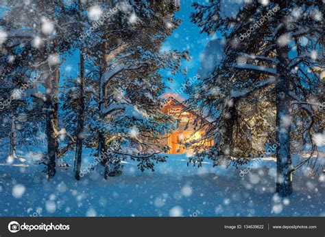 Warm House In Night Winter Forest With Snowfall — Stock Photo © Ataiga