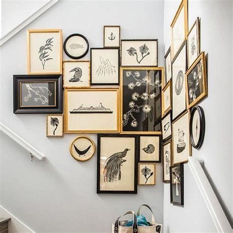 Happy Monday! Check out this corner gallery wall of perfection! Love the different sizes and ...