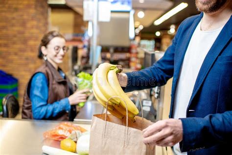 Man Packing Food At The Cash Register Stock Image Image Of Food