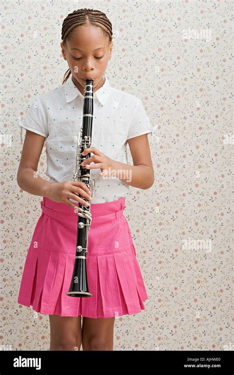 Girl Playing Clarinet Stock Photo Alamy