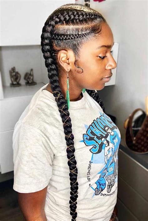 A two braids hairstyle using one to make a dutch braid crown on the head and the other left to hang across the shoulder. 45 Enviable Ways To Rock The Latest Black Braided ...