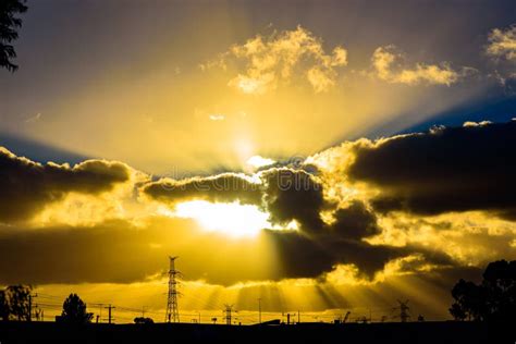 A Epic Sun Setting Behind Clouds Stock Image Image Of Clearing