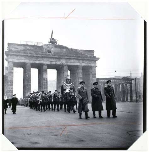 When the berlin wall went up in 1961, the gate stood. Soviet Troops March through Brandenburg Gate to Celebrate ...