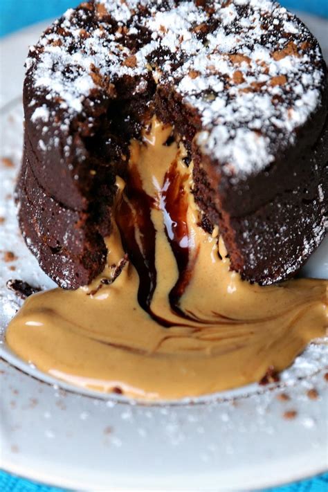 Run a knife around the edge of each cake to help release them from their ramekin. Peanut Butter Chocolate Molten Lava Cakes Recipe | Jenns ...