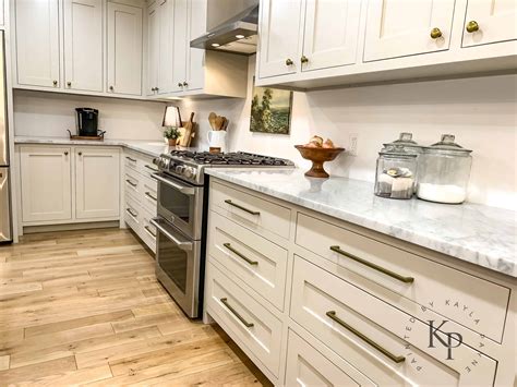 You might also like this photos or back to special of revere pewter kitchen cabinets. Carrara Marble Countertops, marble countertop island ...