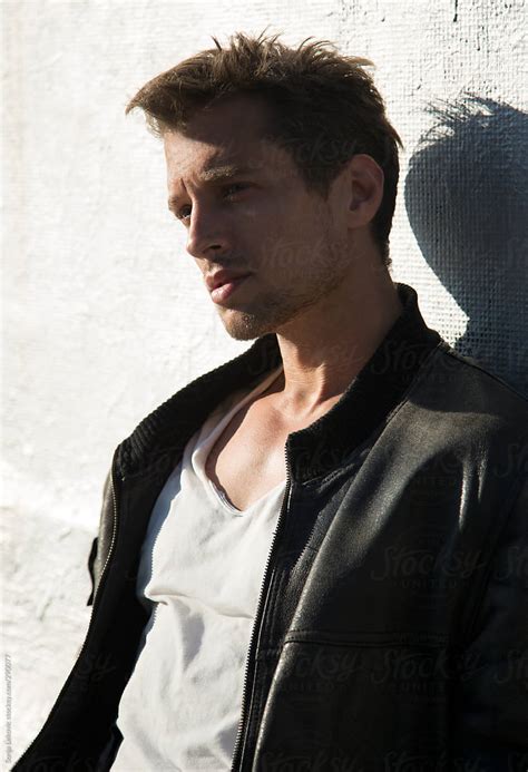 Handsome Man In Black Leather Jacket And White T Shirt By Stocksy Contributor Sonja Lekovic