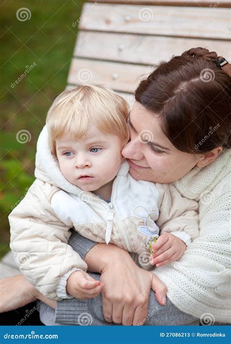 Young Mother And Toddler On Bench In Park Stock Image Image Of Skin
