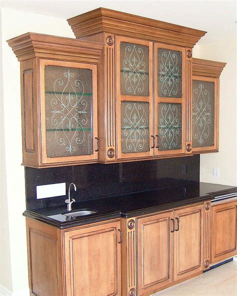 Adding a glass kitchen cabinet, or many cabinets, to your home is a great way to make your kitchen stand out. Decorative Cabinet Glass Inserts :: Custom Cabinets