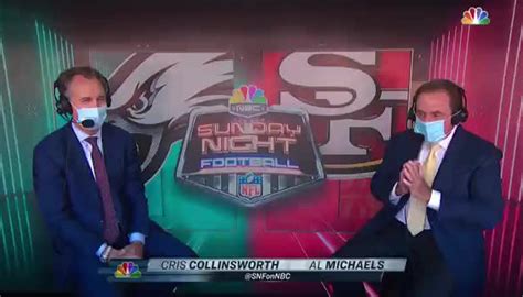 Al Michaels Cris Collinsworth Reluctantly Wear Masks During Sunday Night Football In Santa