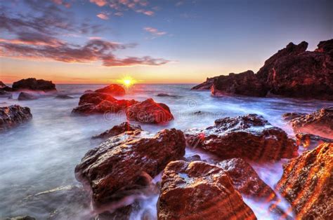 Beautiful Sunrise On Rocky Shore Stock Image Image Of Ocean