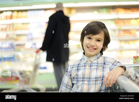 Boy In Supermarket Stock Photo Alamy