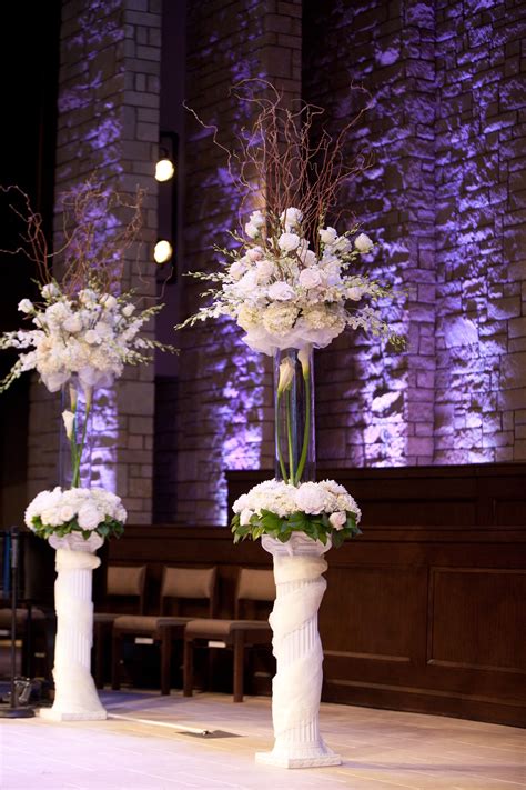 Make your wedding ceremony of one of the most memorable moments in your life! Wedding Ceremony Flowers tall vases with beautiful wrapped ...