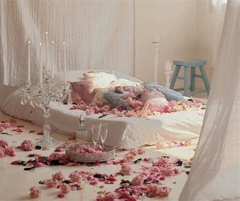 amazing bed with flowers candle lit ♡ romantic bedroom design romantic interior romantic