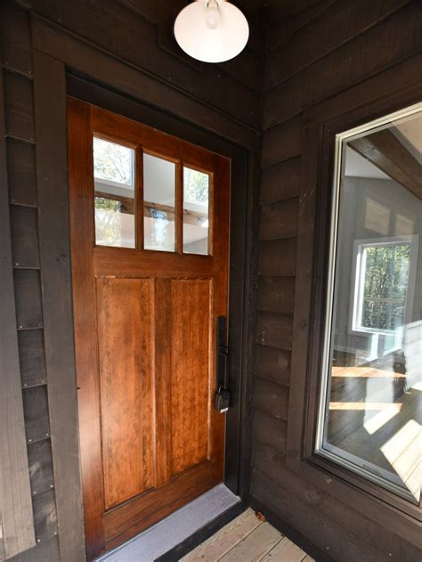 Mahogany Front Door With Black Siding Modern Ranch Style Homes
