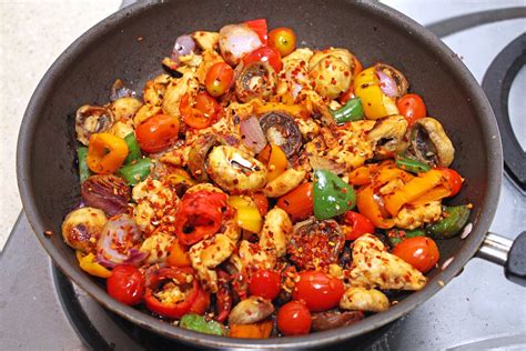Toss the ingredients from the centre to the side of the wok using a wooden spatula. Easy Chicken Stir Fry - Maya Kitchenette