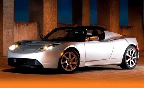 These rocket engines dramatically improve acceleration, top speed, braking. Charleston Cars and Coffee Gallery - 2011 TESLA Roadster