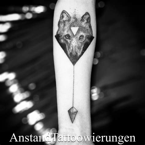 Dotwork Tattoo On Arm Triangle Wolf Head